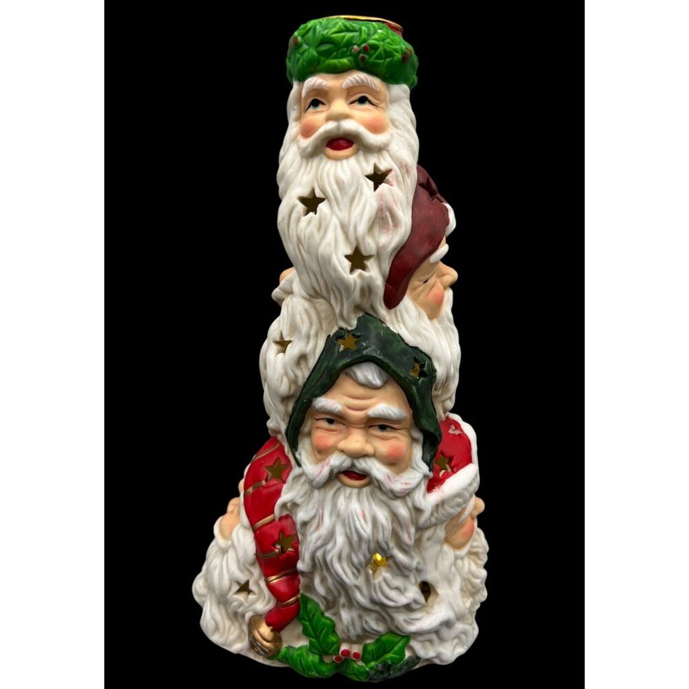 The Many Faces of Santa Lighted Figurine